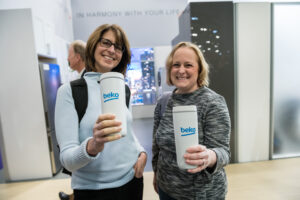 KBIS 2023 Hard Hat Media Tour attendees showing off their Beko merchandise.
