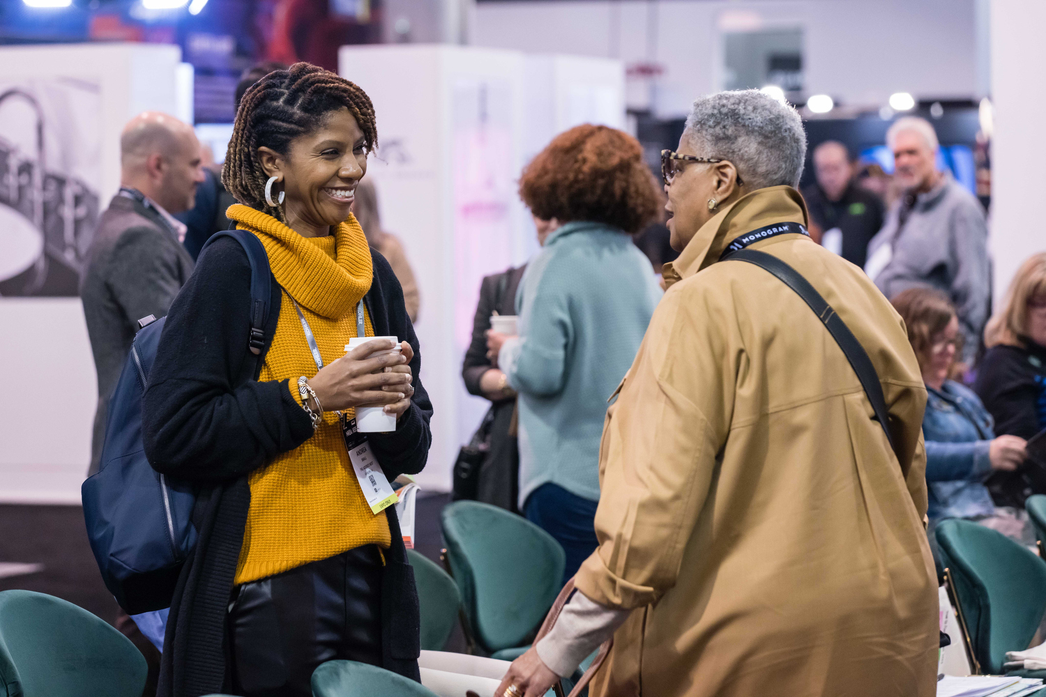 Designers networking on the KBIS show floor. 