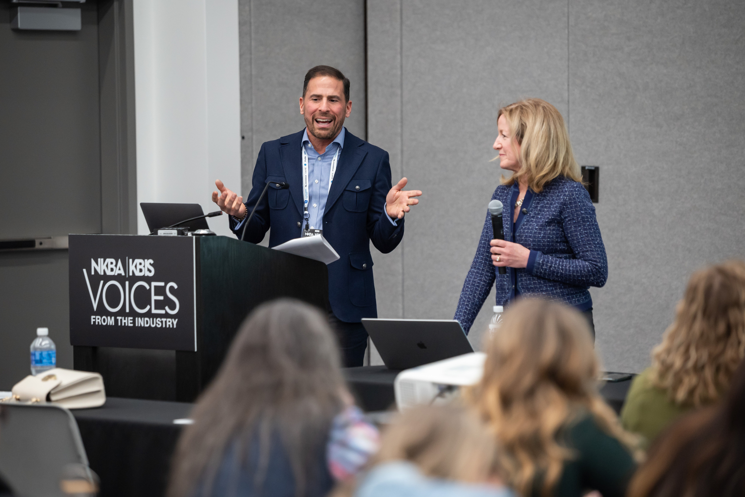 3727_PWP_NKBA_KBIS25 A speaker laughs while presenting at the VFTI Conference at KBIS 2024