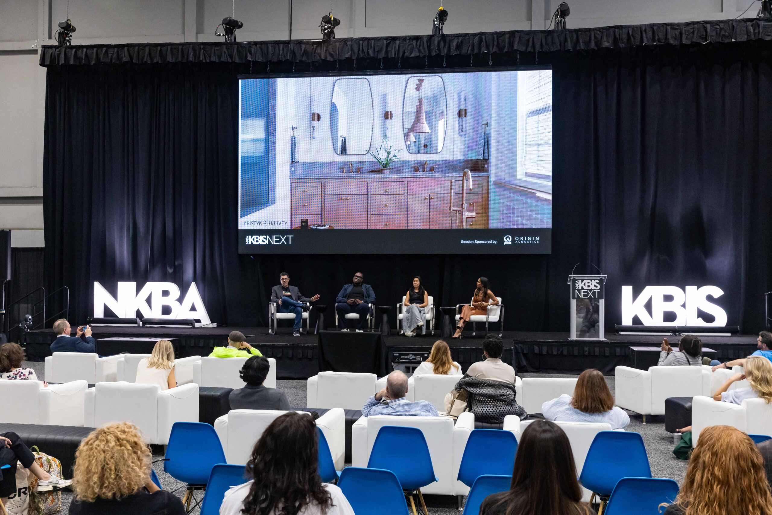 A crowd watches an engaging session at KBIS NEXTStage at KBIS 2024